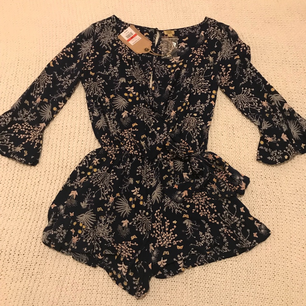 New with tag. XS navy floral romper